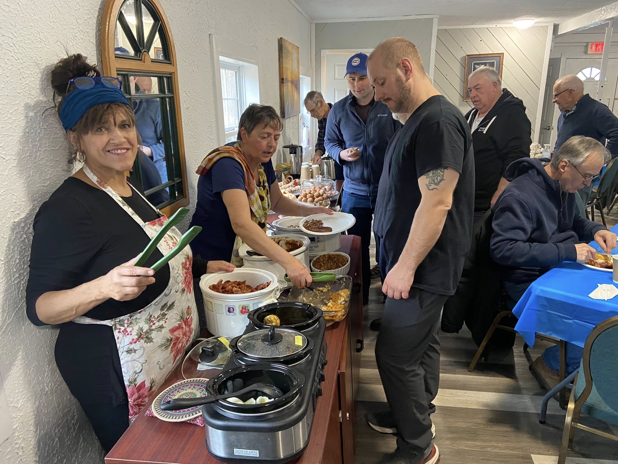 Congregation members demonstrating compassion and community service in Earl Grey